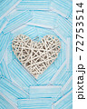 White heart on a background of a blue faces masks. Concept of a Valentines day during Coronavirus or Covid pandemic. 72753514