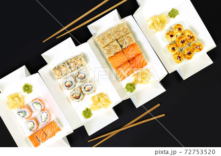 Japanese food delivery concept, set of sushi rolls with fish and cheese 72753520