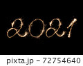2021 New Year inscription with sparklers . 72754640