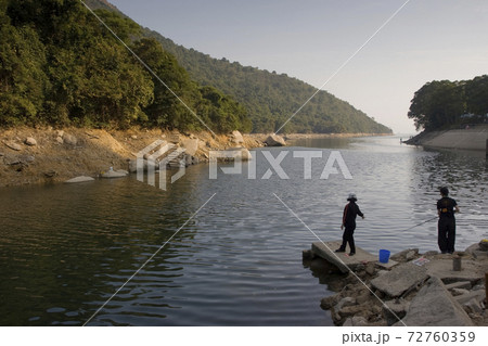 1 Jan 2006 people fishing at Plover Cove Country , hk 72760359