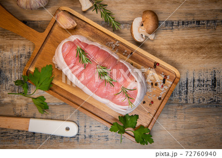 Raw veal meat on wood background 72760940