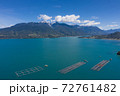 Aerial salmon farms at Reloncavi marine strait at Llanquihue National Park, Chile, South America. 72761482