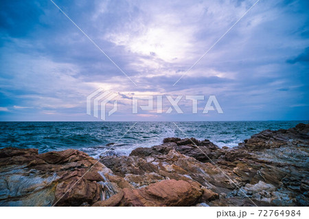Sea Ocean with Smooth Wave and Rock landscape with blue sky. Nature of Seascape vacation time. Sea Ocean with Smooth Wave and Rock landscape with blue sky. Nature of Seascape vacation time. 72764984