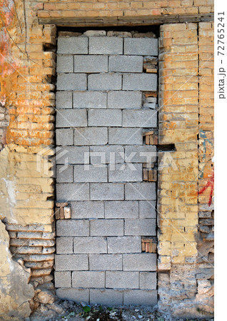 bricked up door and chipped brick wall texture bricked up door and chipped brick wall texture 72765241