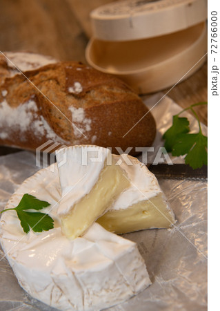Camembert cheese on a wooden background Camembert cheese on a wooden background 72766000