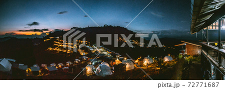 Aerial view of camping grounds and tents on Doi Mon Cham mountain in Mae Rim, Chiang Mai province Aerial view of camping grounds and tents on Doi Mon Cham mountain in Mae Rim, Chiang Mai province 72771687