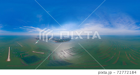 360 panorama by 180 degrees angle seamless panorama of aerial view of aquaculture nets for fish farm in a lake in Sri Racha, Chonburi, Thailand. tropical beach, Andaman sea, bay island. Top view. 72772184