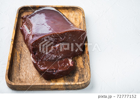 Beef liver on white background with copy space Beef liver on white background with copy space 72777152