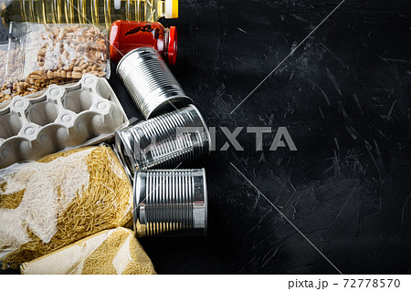 Food set for home delivery or donation with space for text,on black background 72778570
