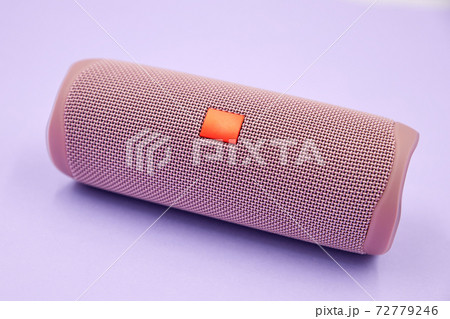 Portable bluetooth and wireless speaker on a colored background. Portable bluetooth and wireless speaker on a colored background. 72779246