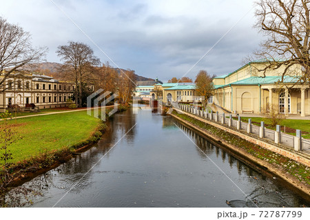 A promenade along a river channel in Bad Kiesseng, Germany. 72787799