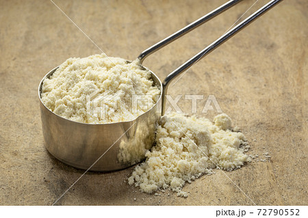 scoop of whey protein powder scoop of whey protein powder 72790552