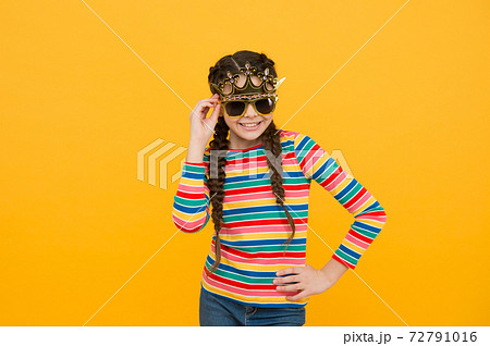 Party celebration. Celebrate as real queen. Kid wear golden crown. 72791016