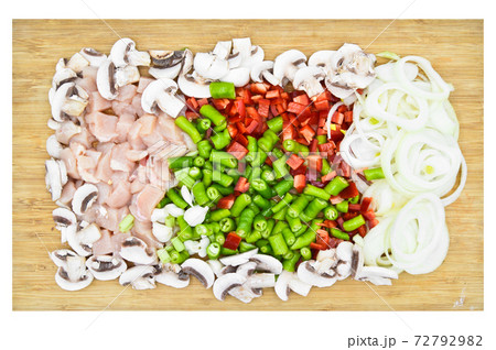 Organic fresh chili onion mushroom chicken meat, assorted cut vegetables on bamboo cutting board 72792982