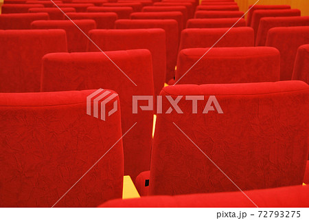 Modern cinema hall empty and red comfortable seats Modern cinema hall empty and red comfortable seats 72793275