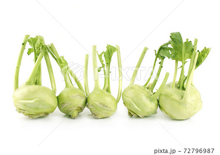Fresh kohlrabi with green leaves on isolated white background 72796987