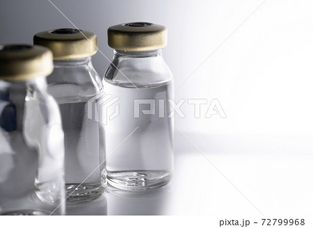 Studio shot of laboratory vials with liquid Studio shot of laboratory vials with liquid 72799968