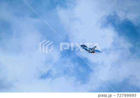 F-16 Fighting Falcon flying against sky F-16 Fighting Falcon flying against sky 72799995