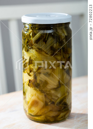 Closed mason jar with pickled chard Closed mason jar with pickled chard 72802213