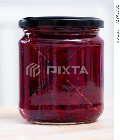 Glass jar of homemade pickled beetroot Glass jar of homemade pickled beetroot 72802701