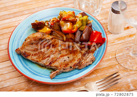 Appetizing beef entrecote with baked vegetables Appetizing beef entrecote with baked vegetables 72802875