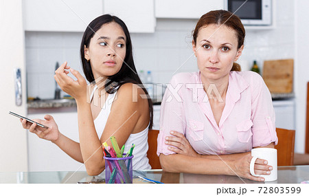 Girl using smartphone Girl using smartphone 72803599