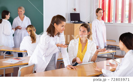 Medical students during recess between lectures Medical students during recess between lectures 72803971