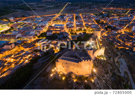 Aerial view of fortified Castalla Castle on stone hill in twilight, Spain 72805000