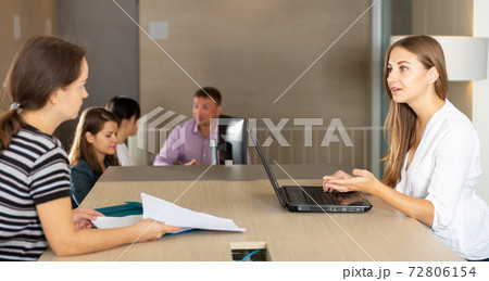Woman notary receiving customers Woman notary receiving customers 72806154