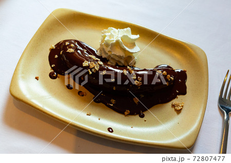 Fried plantain with melted chocolate Fried plantain with melted chocolate 72807477
