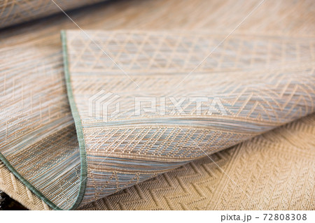 diversity of straw carpets in the store 72808308