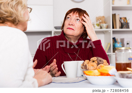 Old women in the kitchen quarrel 72808456
