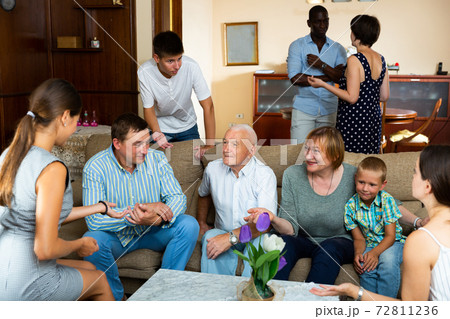 Large family having meeting at home Large family having meeting at home 72811236