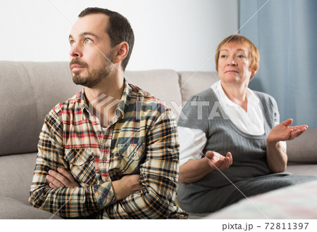 Mother and son arguing Mother and son arguing 72811397