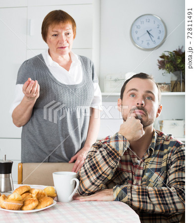 Mother and son arguing Mother and son arguing 72811491