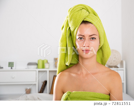Female in bath towels in bedroom Female in bath towels in bedroom 72811551