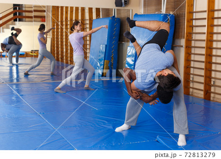 Two men practicing self defense techniques Two men practicing self defense techniques 72813279