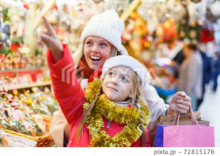 Happy family on Christmas market Happy family on Christmas market 72815176