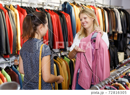 Two women in leather clothes shop Two women in leather clothes shop 72816305
