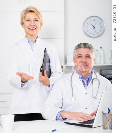 Doctor and nurse waiting for patients Doctor and nurse waiting for patients 72816455
