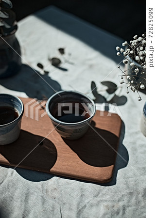 A cup of aromatic black coffee A cup of aromatic black coffee 72825099
