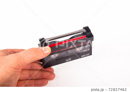 Small old MiniDV format video cassette, isolated on white background Small old MiniDV format video cassette, isolated on white background 72827462