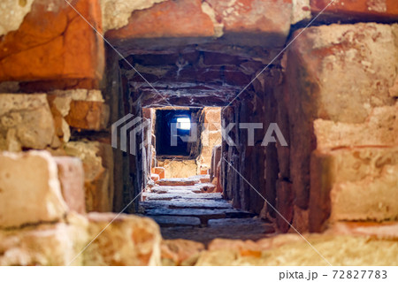 A chimney in an old brick house of the 18th century 72827783