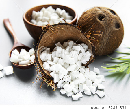 Dried sweet coconut cubes in bowl Dried sweet coconut cubes in bowl 72834331
