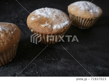Cakes on a dark stone background 72837023