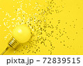 One yellow decorative lamp on a gray background. 72839515