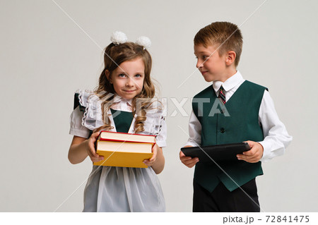 Schoolchildren in uniform 72841475