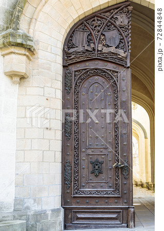 An old wood door with metal handle An old wood door with metal handle 72844848
