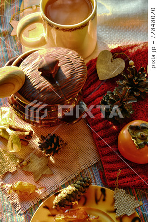 Beautifully laid table for a festive dinner. A pot of hot soup is waiting for the guest at the table. The view from the top. Vertical photo. Beautifully laid table for a festive dinner. A pot of hot soup is waiting for the guest at the table. The view from the top. Vertical photo. 72848020