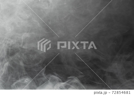 dense smoke on black background 72854681